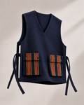 IBERƎ Apron Vest — an open-sided, tie-closed layering vest, tailored by hand in Lagos, Nigeria.